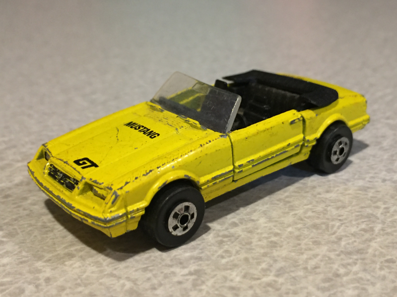 I love old Road Champs cars, and this metal base Mustang also has a tonneau for use when the removable top is off!